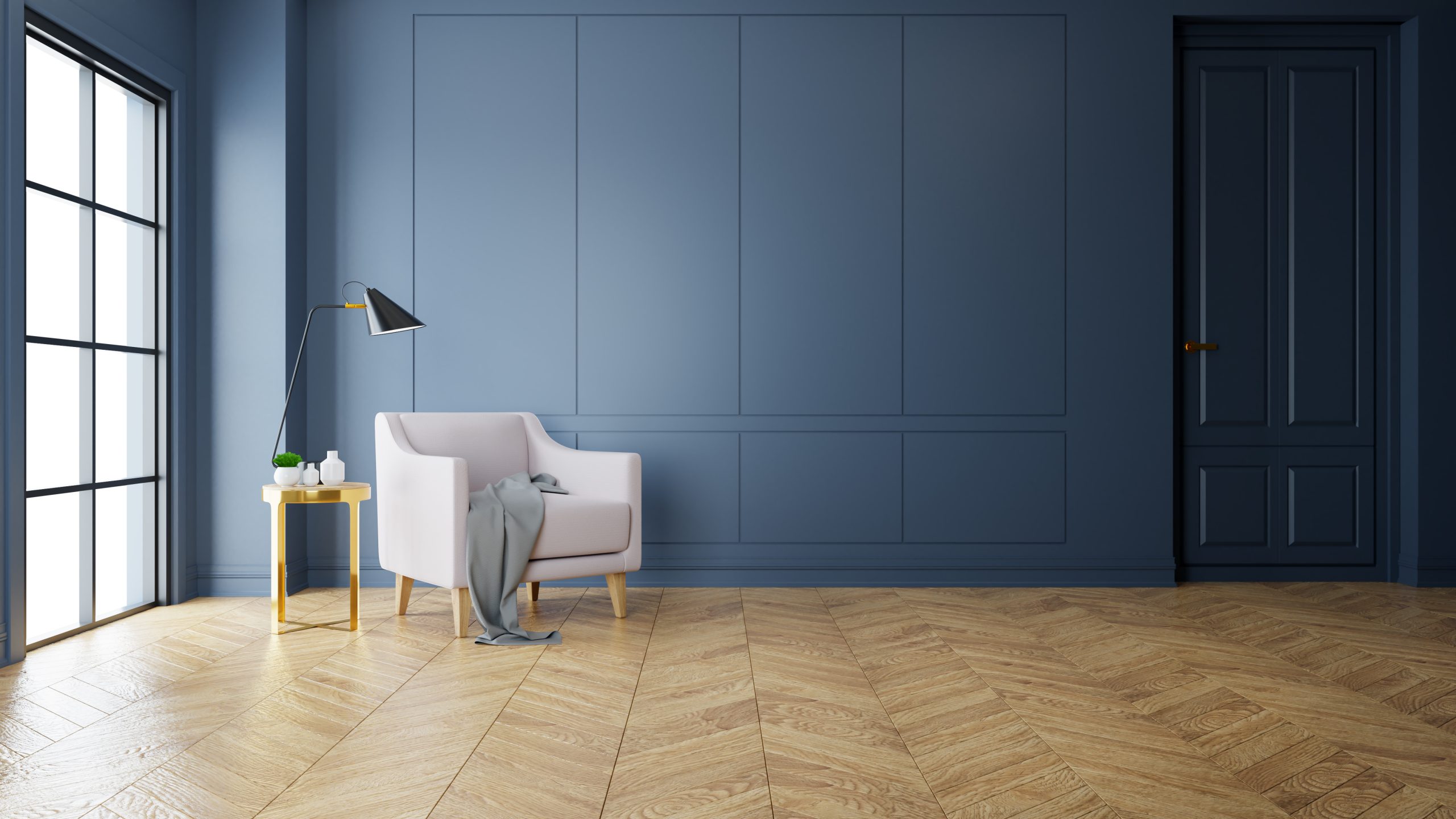 Restoring parquet floors in Harrow – elegant lounge with a newly finished herringbone oak parquet wood floor, satin sheen under blue panelled walls and a modern armchair.
